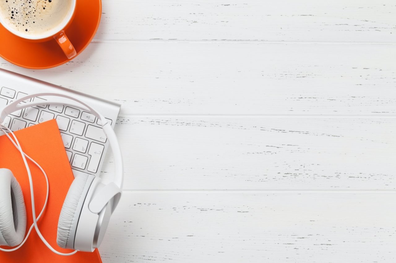 office-workplace-with-coffee-headphones-and-pc.jpg